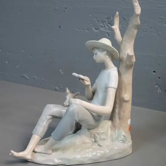 large Nao figurine - boy reading a book with dog H-315