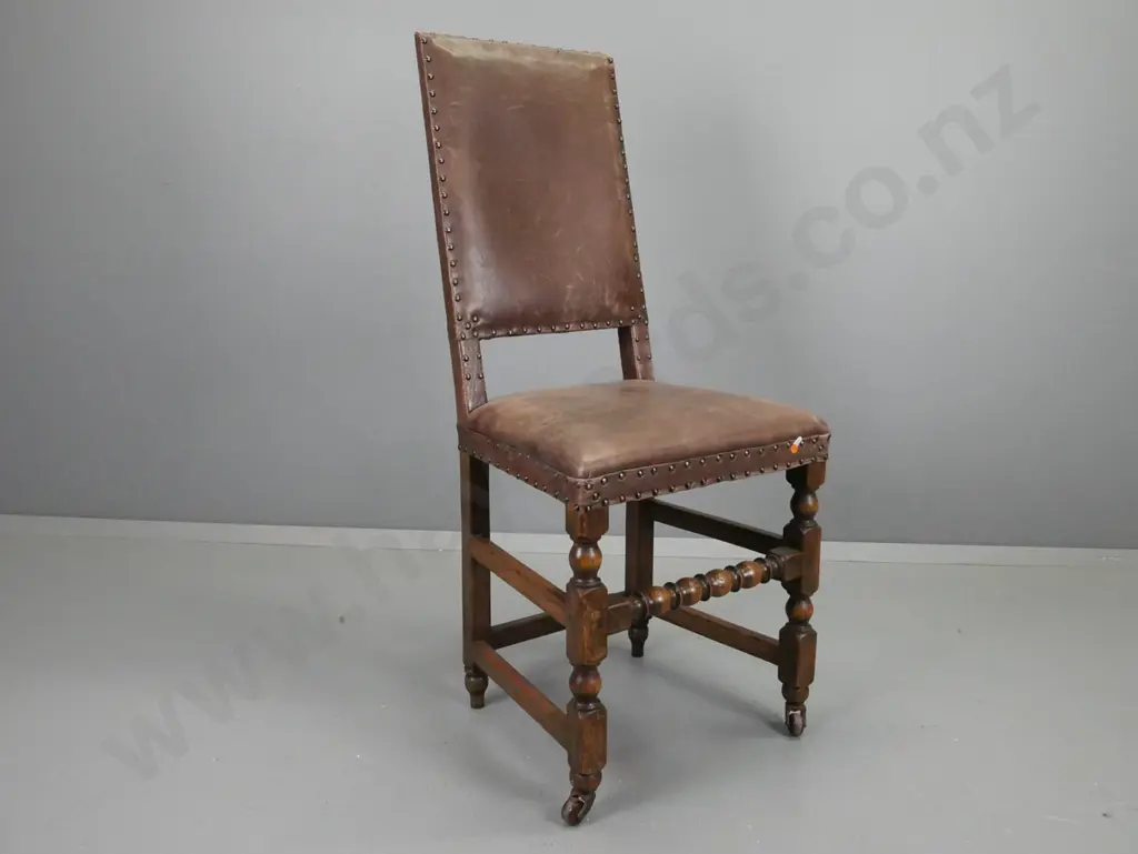19th century Tudor style leather covered high-back chair w/ turned stretcher base on porcelain casters H-1140 W-510 Image 1++