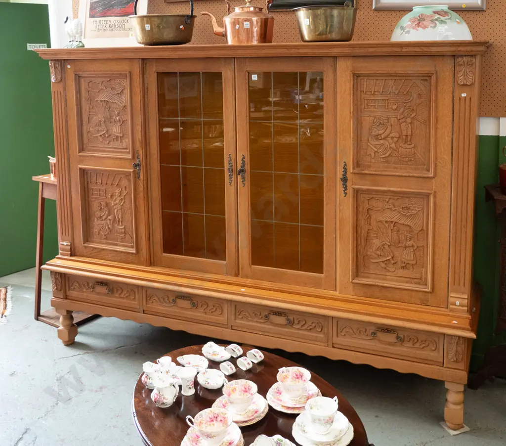 large northern European oak 4-drawer display cupboard 2 leadlight centre doors, 4 carved door panels w/village scenes, Image 1++