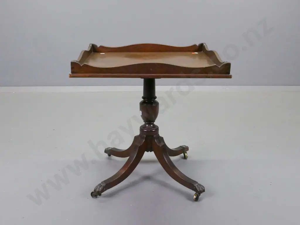mahogany tray-top side table on pedestal base with 4 sweeping legs, brass paw feet & casters H-510 L-490 W-440 Image 1++
