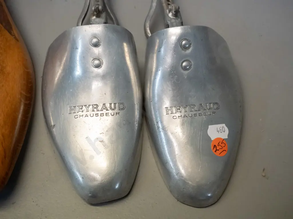2 pairs vintage shoe lasts - timber (beech?) pair with hinges and embossed 12460 / 43, aluminium pair marked Heyraud Image 1++