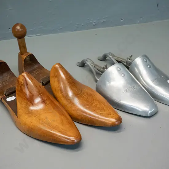 2 pairs vintage shoe lasts - timber (beech?) pair with hinges and embossed 12460 / 43, aluminium pair marked Heyraud