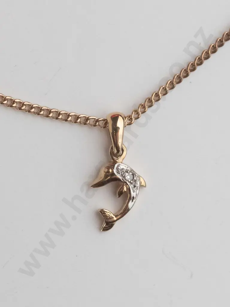 small dolphin necklace stamped 9k Image 1++