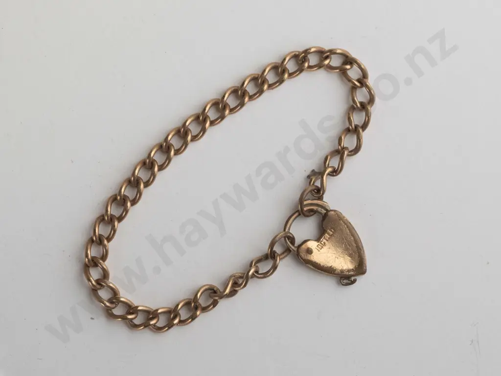 gold babys bracelet with heart clasp stamped 10ct lined Image 1++