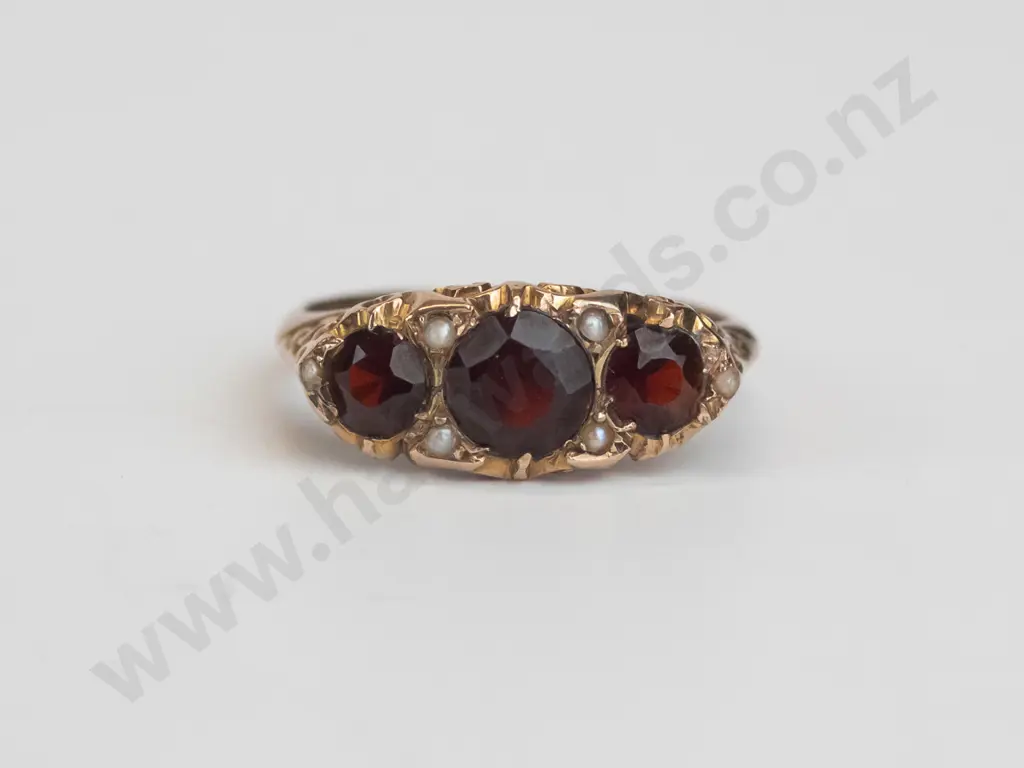 9ct gold English hall marked band 3 garnet & 6 seed pearls 2.6gms [ring has had a band added with hallmarks but lead Image 1++
