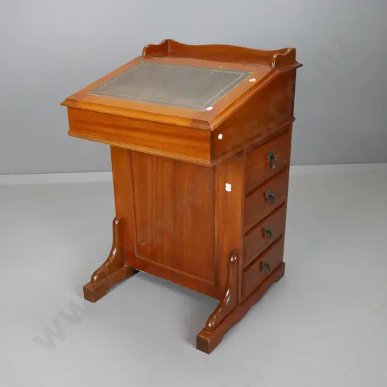 reproduction mahogany Davenport desk with leather inset, 4 drawers on right side with drop handles, fitted interior.