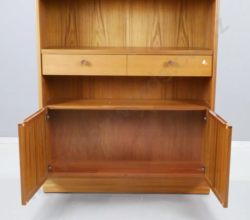 mid-century Parker Knoll teak bookcase with 1 fixed and 3 adjustable shelves, 1 drawer, 2 panelled cupboard doors, Image 1++