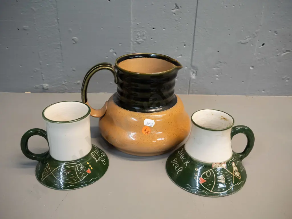 2 NZ studio pottery wide-based mugs marked PS and Carey's Bay H-100 and a Royal Doulton stoneware jug H-150. Mugs have Image 1++