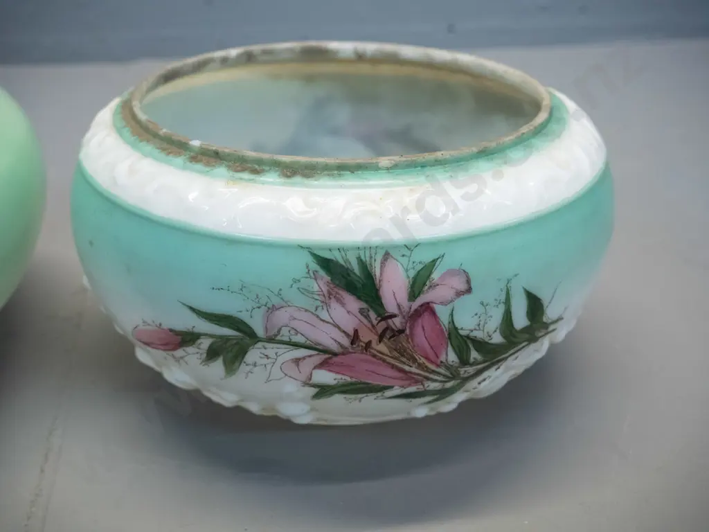 two deco hand-painted-over-transfer milk glass light shades - floral motifs on green, one with chips inside bottom rim. Image 1++