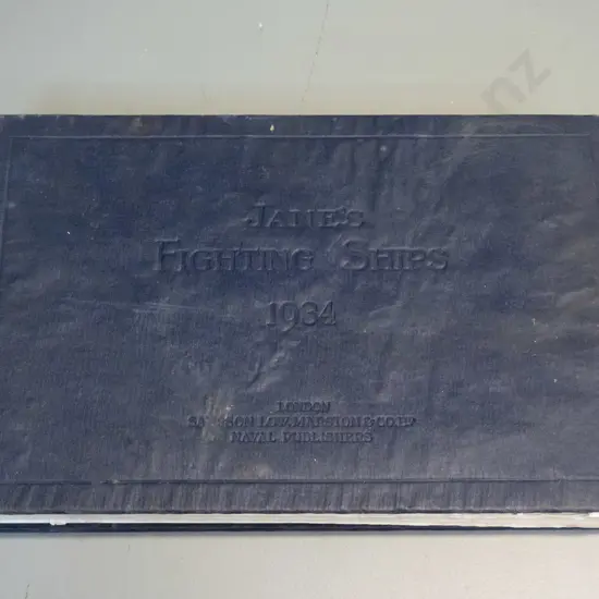 Jane's Fighting Ships register, 1934 edition - rippling and separation to boards, some staining, overall age wear