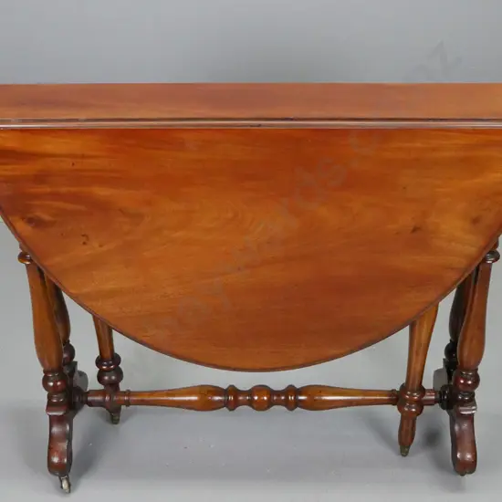 mahogany William IV Sutherland drop-side table on brass casters - old cigarette burn on top, has been repolished H-720