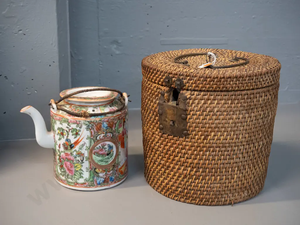 Chinese porcelain teapot with wire and woven cane handles, in an insulated fine cane carry basket w/ metal handles - Image 1++