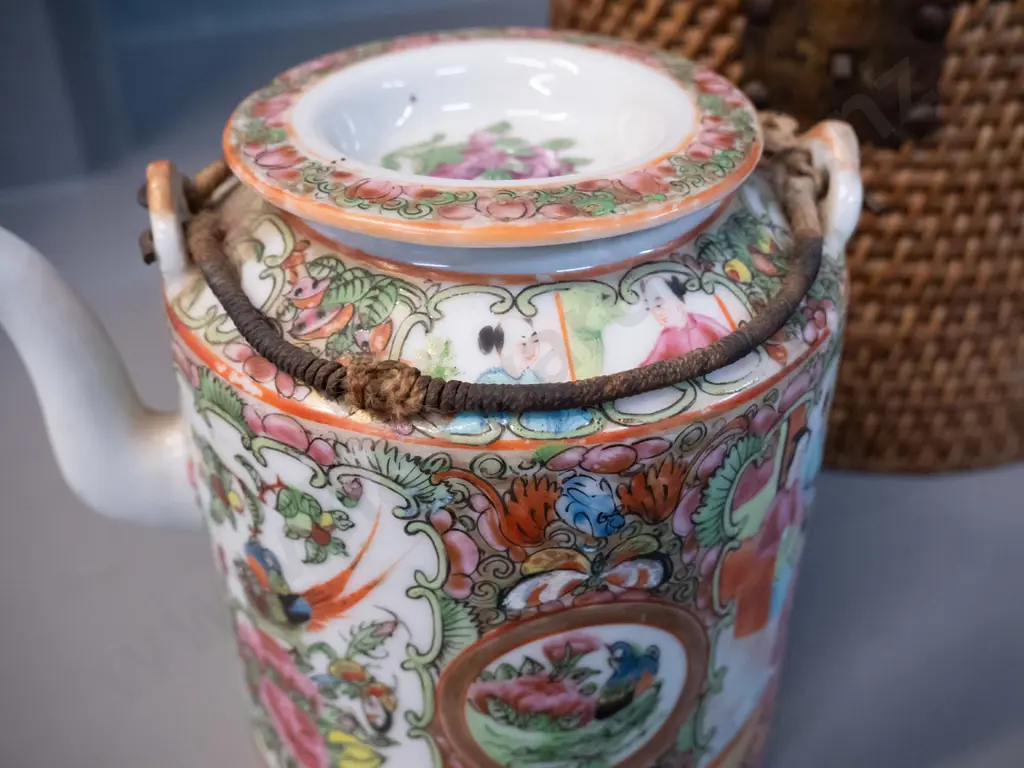 Chinese porcelain teapot with wire and woven cane handles, in an insulated fine cane carry basket w/ metal handles - Image 1++