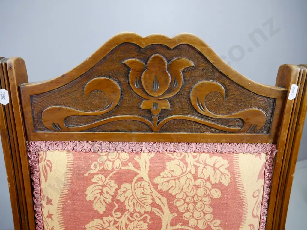 pair of walnut art nouveau style side chairs with shaped, carved crested backs, turned front legs, seat and back covered Image 1++