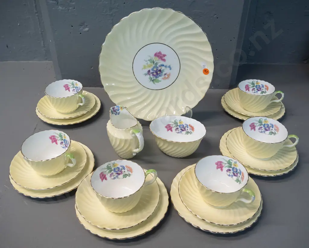 Aynsley yellow and white floral pattern 21-piece tea set - some rubbing to gilt, small chip to cream jug rim near handle Image 1++