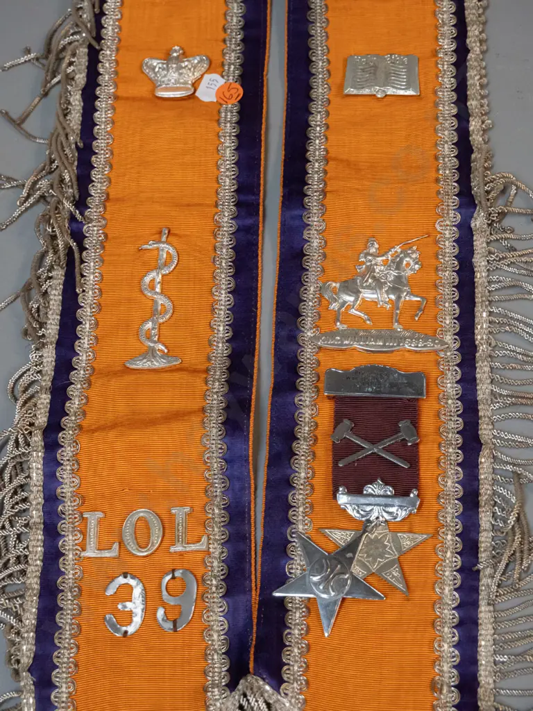 lodge sash with assorted plated metal decorations and a deco style figural frosted glass stopper, chips to stopper end. Image 1++