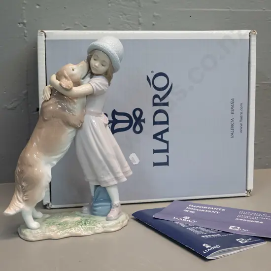 Lladro figurine - " A Warm Welcome" - girl with dog - with original box. H-270 W-150