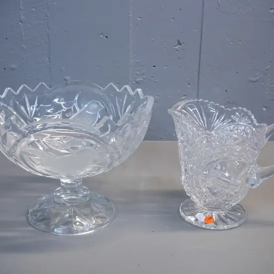2 clear moulded glass items with bird motifs - comport bowl H-170 D-230 and a jug