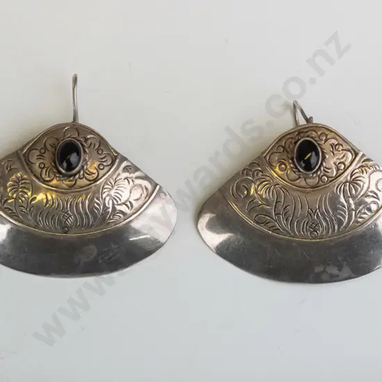 pair of silver earrings stamped 925
