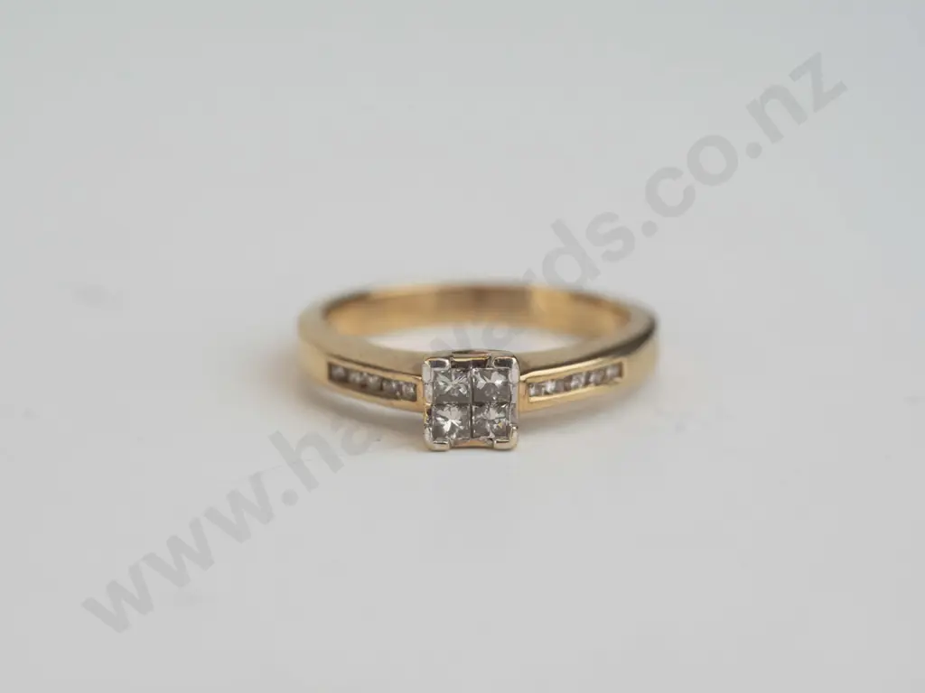 9ct gold diamond ring 4 meter locked diamonds in centre 4 claw coronet 3.5gm, 10 shoulder diamonds Image 1++