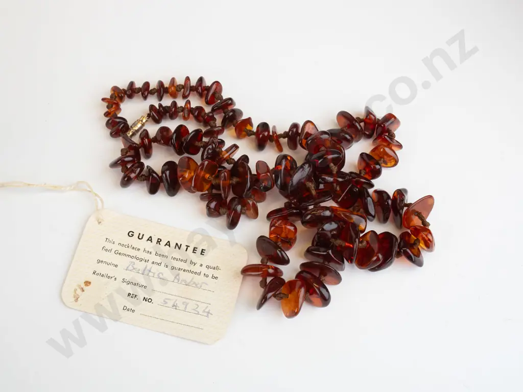 strand of amber graduated 15mm to 7mm baroque button beads rolled gold catch 80cm Image 1++