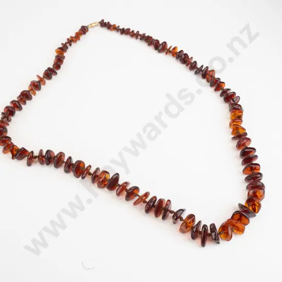 strand of amber graduated 15mm to 7mm baroque button beads rolled gold catch 80cm