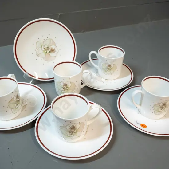 5 Wedgwood Susie Cooper mugs and side plates