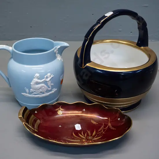 Wedgwood light blue Queen's ware jug, German cobalt and gilt handled basket, and a Carlton Ware Rouge Royal dish with