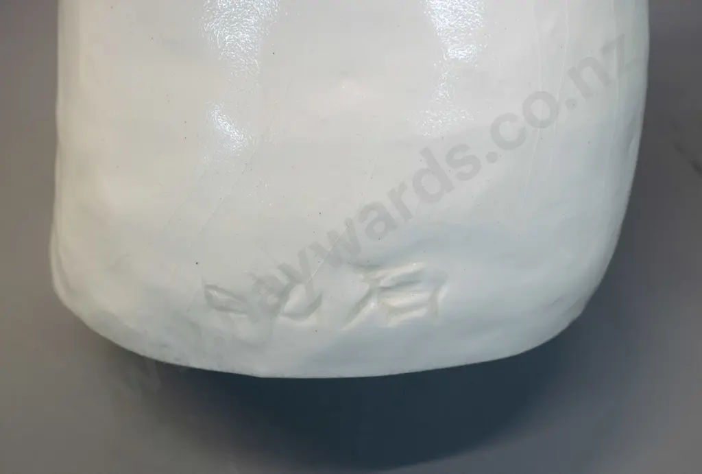 white ceramic figure with upturned sad face - impressed (Japanese?) maker's mark H-320 - some glaze crazing Image 1++