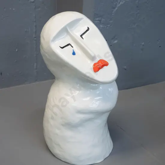 white ceramic figure with upturned sad face - impressed (Japanese?) maker's mark H-320 - some glaze crazing