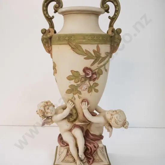 Royal Dux figural urn vase with floral and cherub decoration H-470 W-240