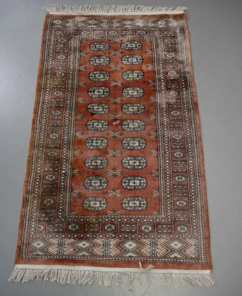 Persian style hand knotted floor rug - terracotta and light browns, some fading, staining on end L-1650 W-930 Image 1++
