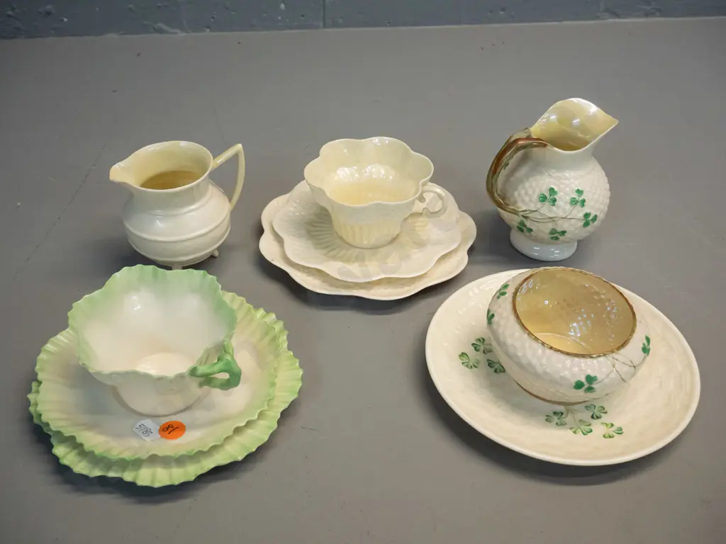 Belleek - black mark - 2 trios, 2 jugs and a sugar bowl - and a green mark spare saucer Image 1++