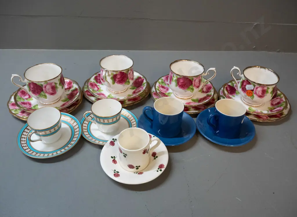 4 Royal Albert Old English Rose trios, one with hairline cracks and 5 demi-tasse cups & saucers - 2 Moorcroft, 2 Doulton Image 1++