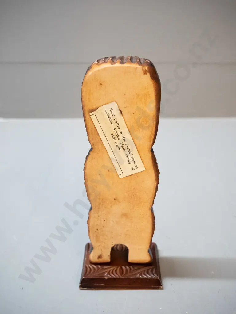3 small souvenir items - carved timber tiki figure with paua insets, a cast brass shoe-horn and a plain timber mere with Image 1++
