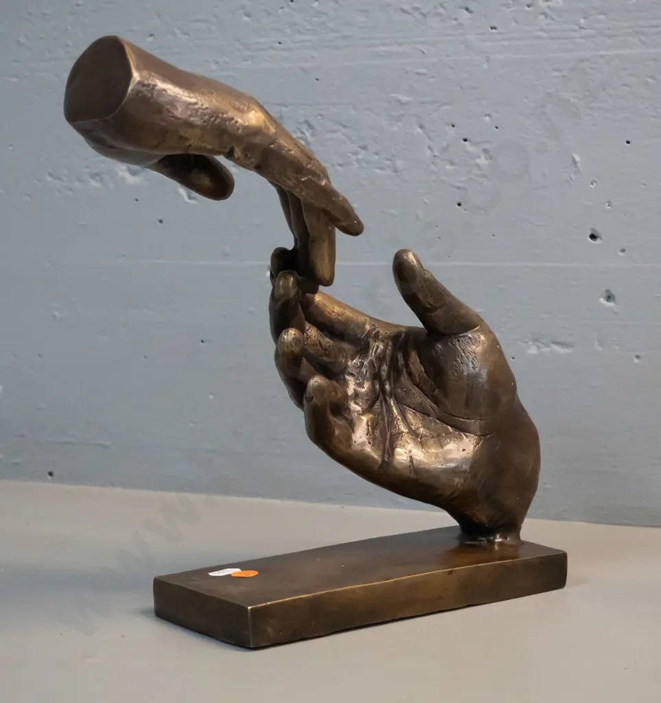 brass or brass finish composite figure of two joined hands on rectangular base H-265 W-280 D-90 Image 1++