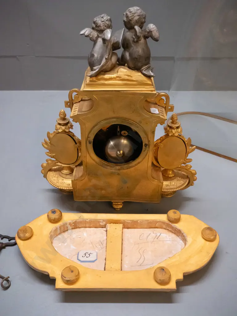vintage ornate figural cast metal French mantel clock on timber with base glass dome, case stamped "PH Mourey" Image 1++