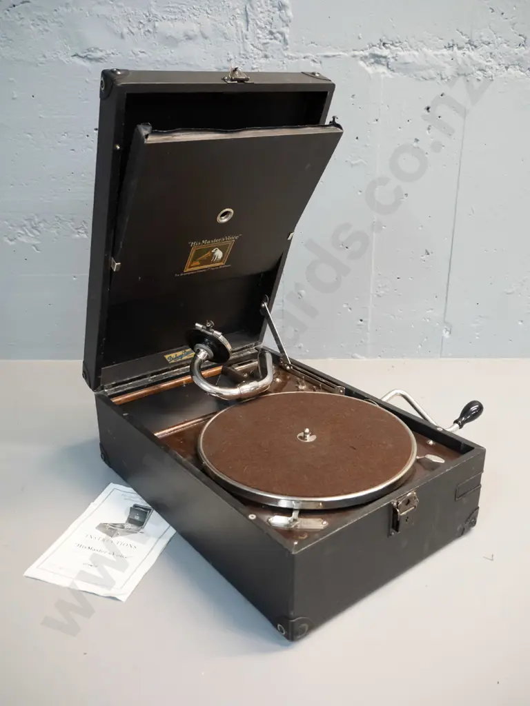 vintage portable wind-up gramophone with His Master's Voice and Dickey's Invercargill decals, with instruction booklet - Image 1++