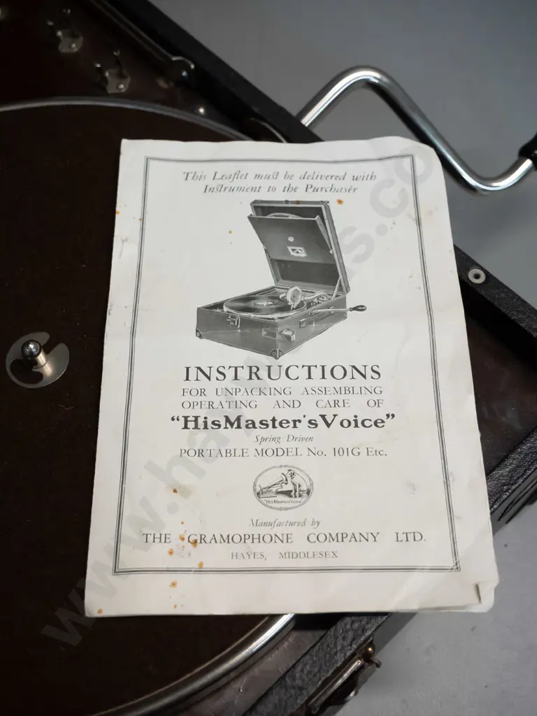 vintage portable wind-up gramophone with His Master's Voice and Dickey's Invercargill decals, with instruction booklet - Image 1++