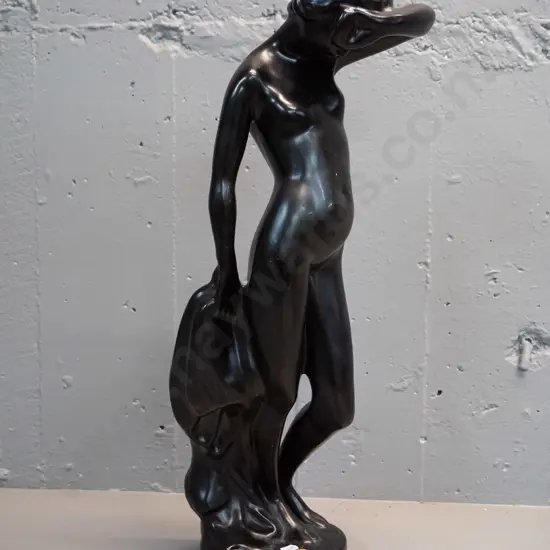 large black painted plaster figurine, initials GM or GH on base - chips, has been retouched, balance a bit off, tends to