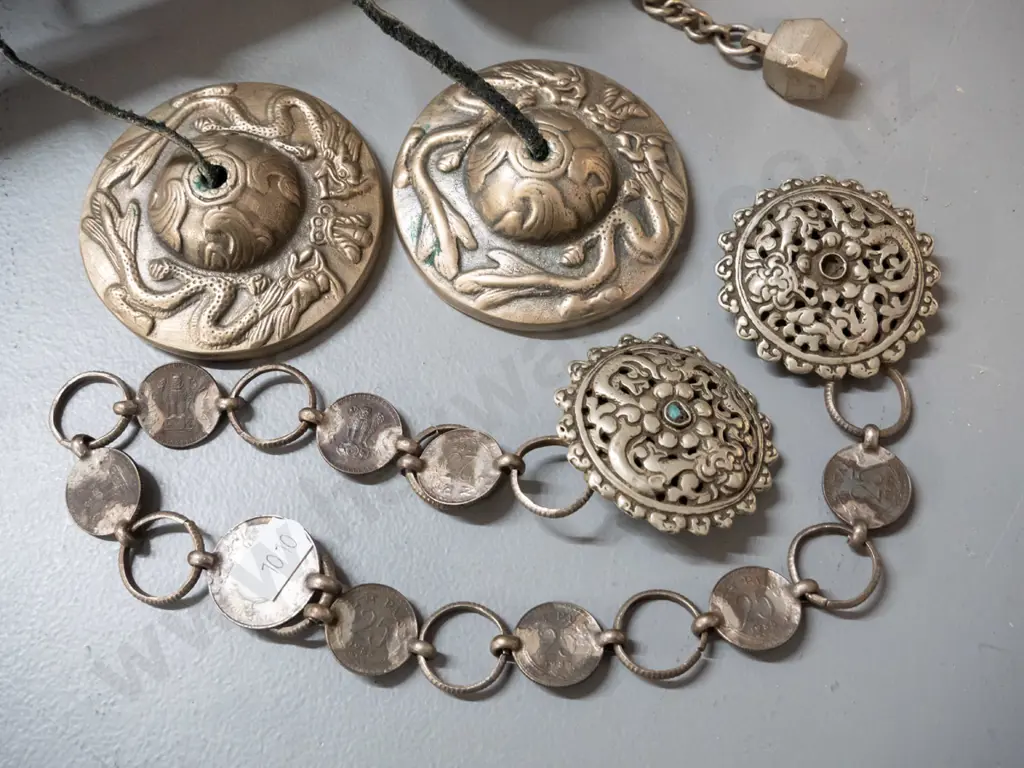 metal and timber prayer wheel and 2 items from Bhutan - clothing clasp with chain made from coins and a pair of small Image 1++
