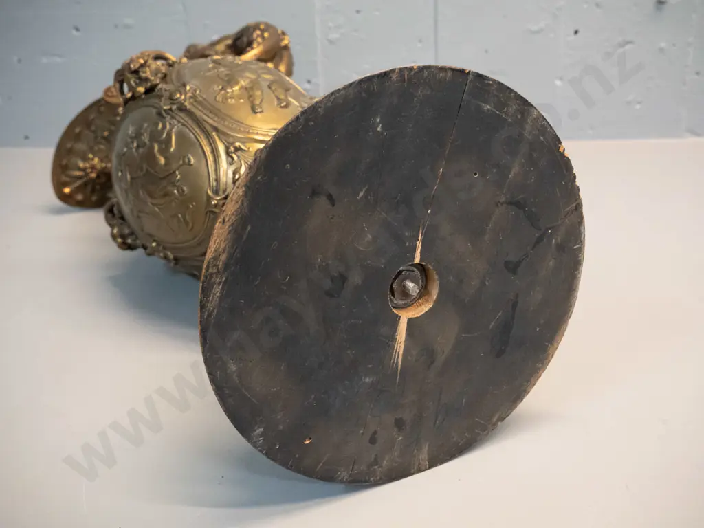 heavy cast metal urn with classical figural motifs, ram's heads, male figural handle, timber base H-610 D-220 at base Image 1++