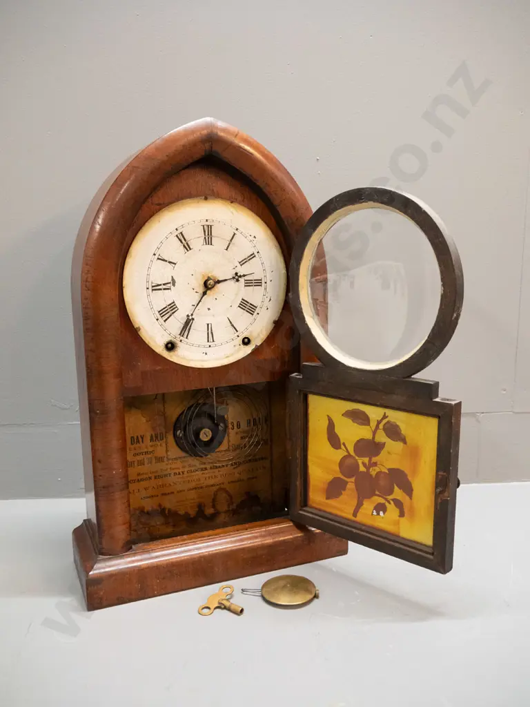 antique cathedral shaped mantel clock with hand painted glass door panel - Ansonia USA / Octagon 8-day clock label Image 1++