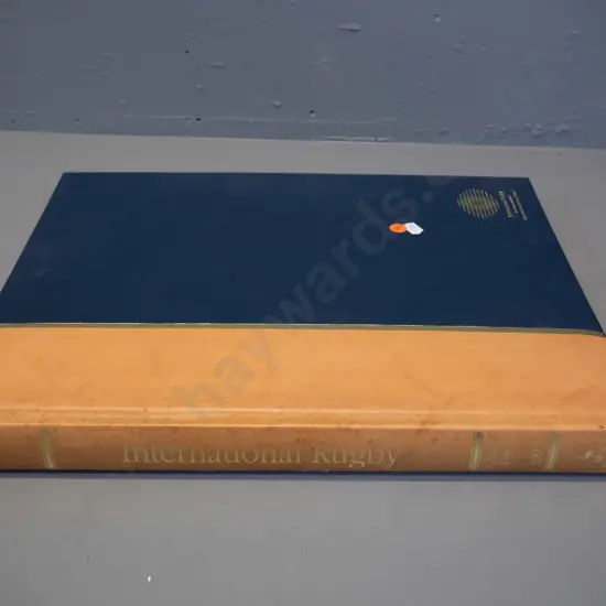 hard cover book - International Rugby 1993 - autographed by Sean Fitzpatrick, limited edition 7 of 1250 - musty, some