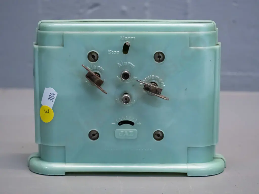 deco French 'Jaz' brand alarm clock in marbled green bakelite case, wind up mechanism is going. Brass bezel has some age Image 1++