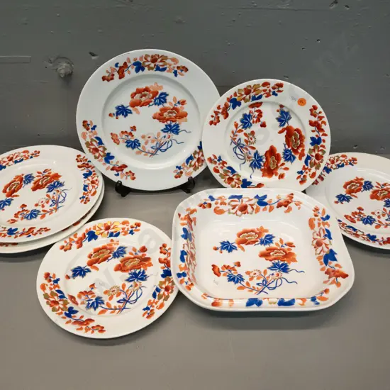 antique hand painted blue and red floral dinnerware - hard to decipher maker's mark on one. Some wear to decoration,