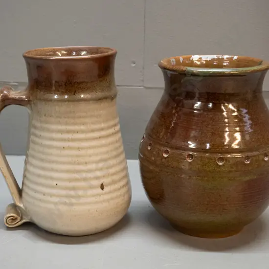2 studio pottery items - large beaker H-180 with scroll handle and a vase - unknown marks, see photos