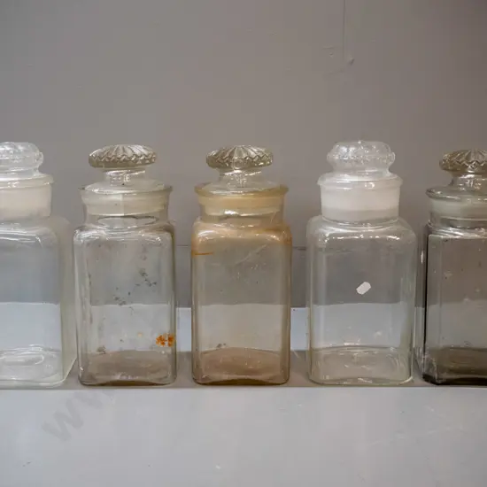 5 vintage glass stoppered confectionary / kitchen storage jars - two lids w/ chips on bottom rim,  2 jars w/chips,