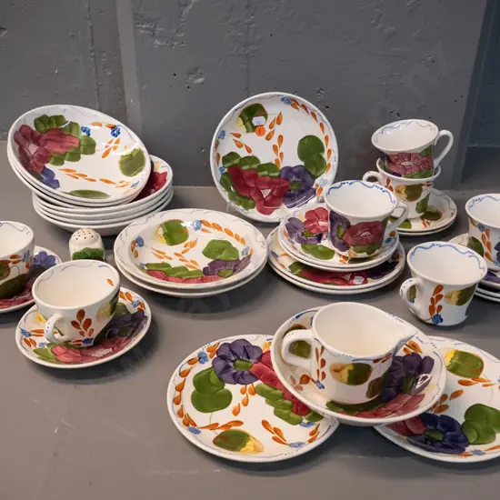 large assortment of hand-painted New Zealand Fleurette tableware, most marked NZ or Crown Lynn, 8 pieces are Brereton