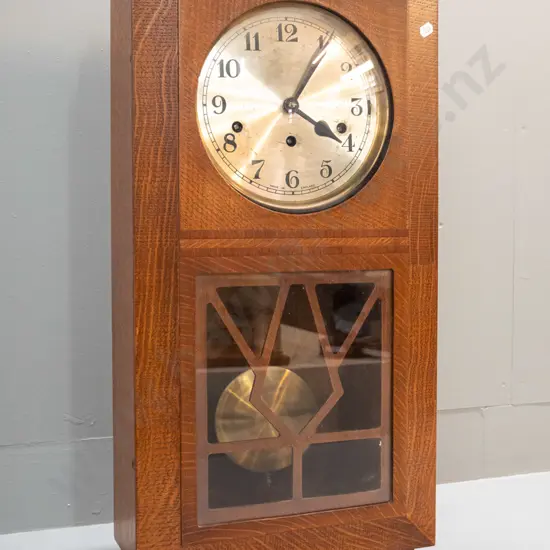 oak cased deco style wall clock - English made, movement is Norland - some scratches to face, no key, has had chime bars